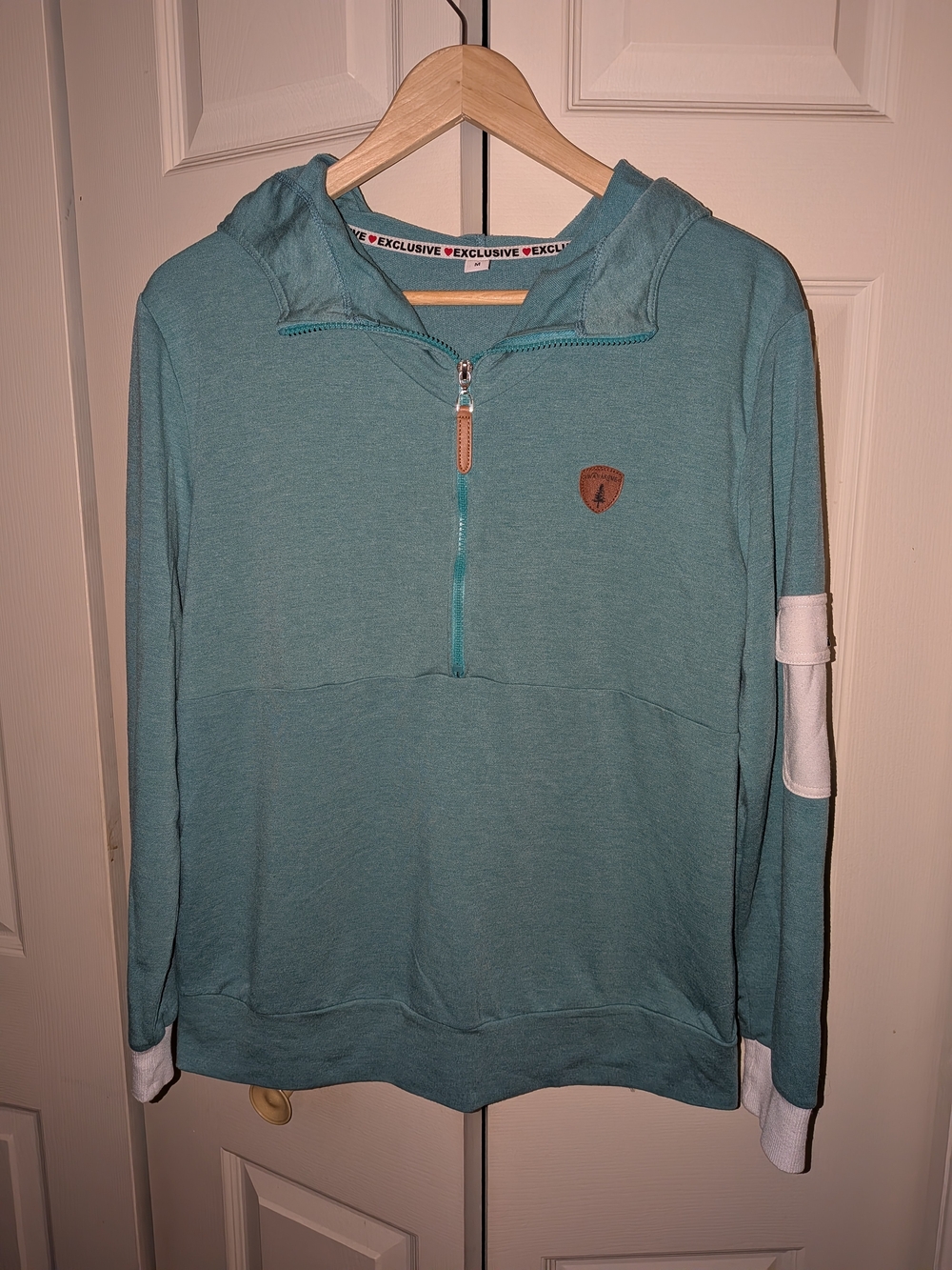 Wanakome Teal Half-Zip Hoodie with White Sleeve Panels